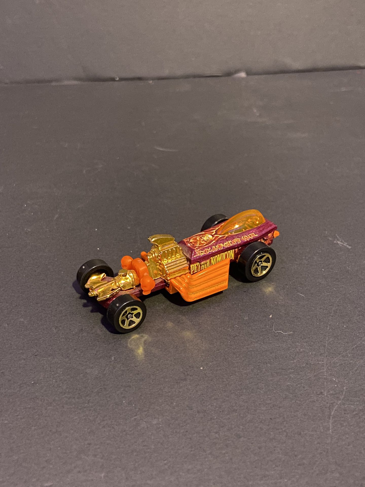 Collectible Item! 1994 HOT WHEELS ORANGE & PURPLE PETROLNOMICON RACE CAR