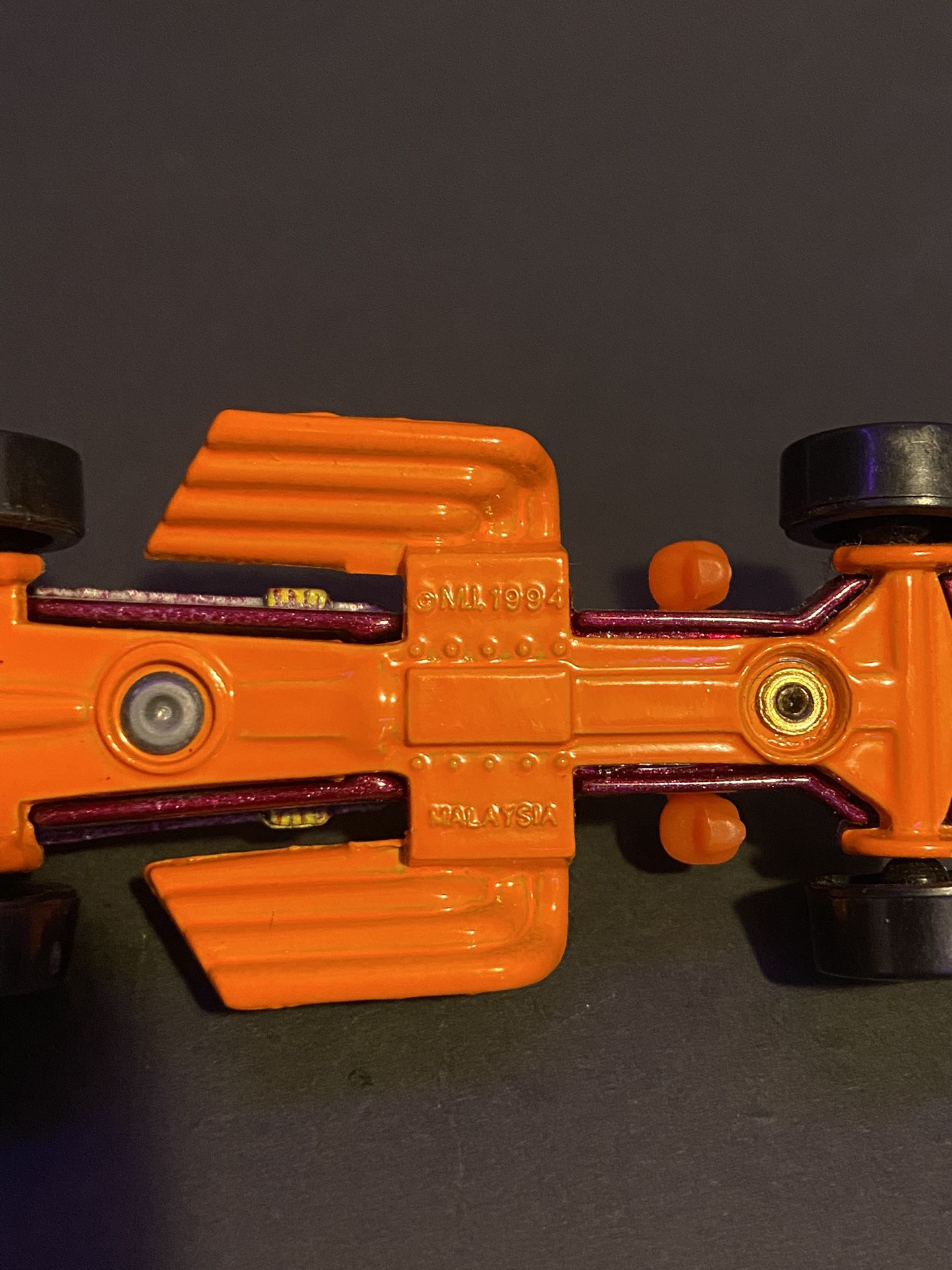 Collectible Item! 1994 HOT WHEELS ORANGE & PURPLE PETROLNOMICON RACE CAR